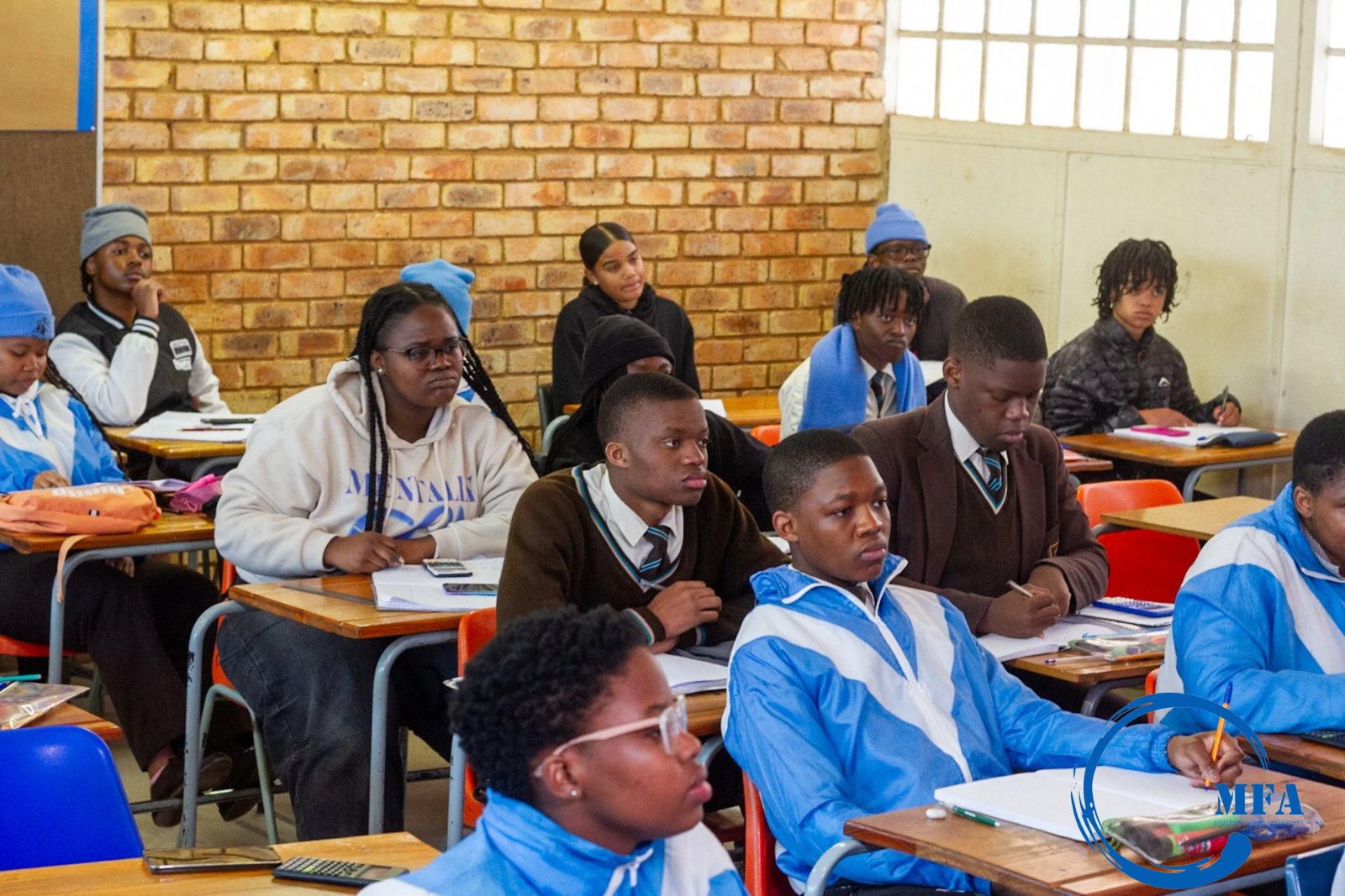 Students listening attentively in class